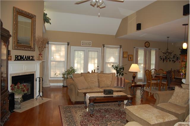 2007 Tamara Court Springfield, TN 37172 - Photo 4 of 20 The tall ceilings and openness make this great room impressive. This view shows the great room opening up to breakfast room and bar top eating area in kitchen. The great room also opens up to the back deck.