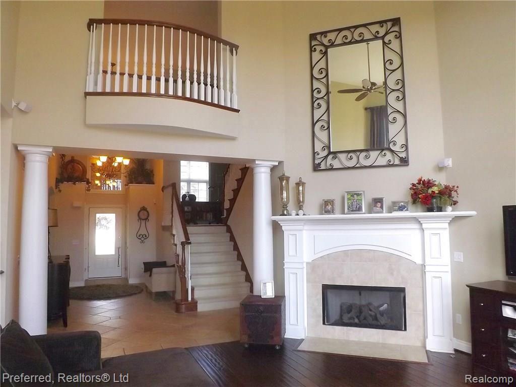 147 West Reed Lk Court Commerce Township, MI 48382 - Photo 5 of 46 Great Room w/Gas Fireplace
