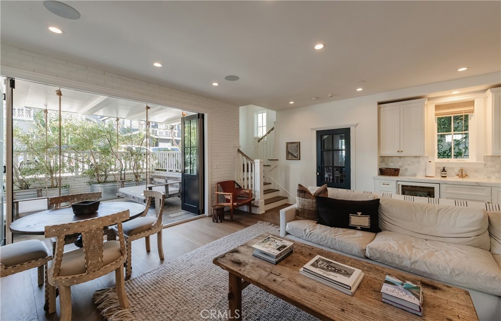 441 3rd Street Manhattan Beach, CA 90266 - Photo 12 of 30 a living room with furniture and a large window