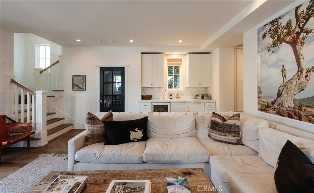 441 3rd Street Manhattan Beach, CA 90266 - Photo 13 of 30 a living room with furniture and a large window