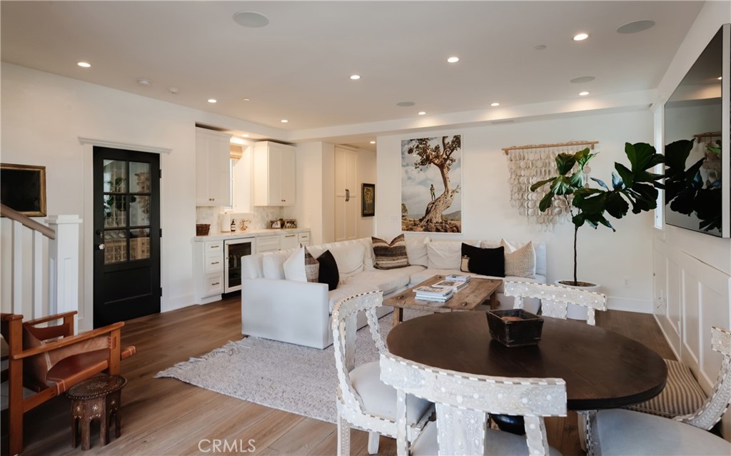441 3rd Street Manhattan Beach, CA 90266 - Photo 14 of 30 a living room with furniture kitchen view and a large window