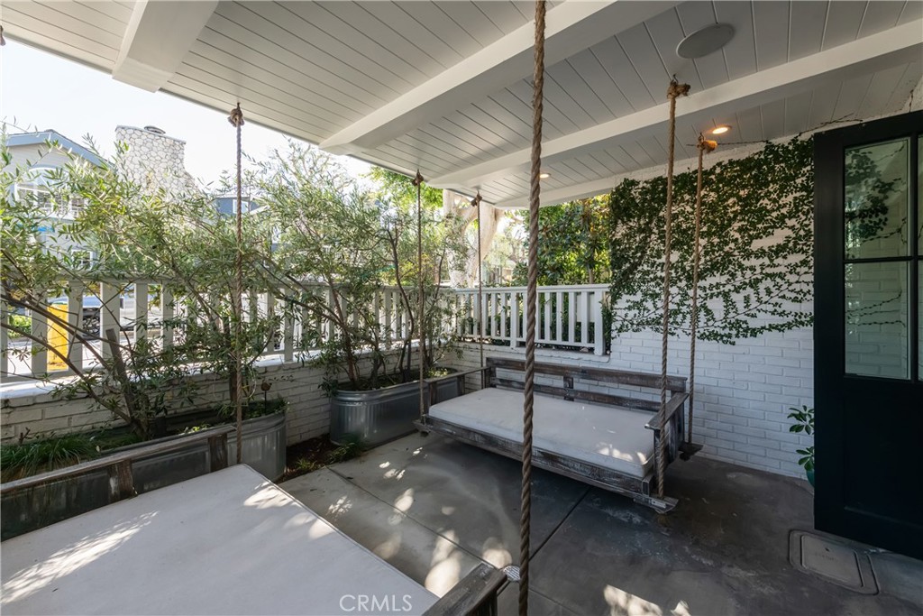 441 3rd Street Manhattan Beach, CA 90266 - Photo 15 of 30 a view of a patio with a table and chairs