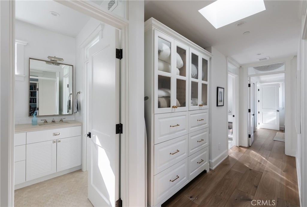 441 3rd Street Manhattan Beach, CA 90266 - Photo 23 of 30 a view of bathroom with a toilet sink and mirror