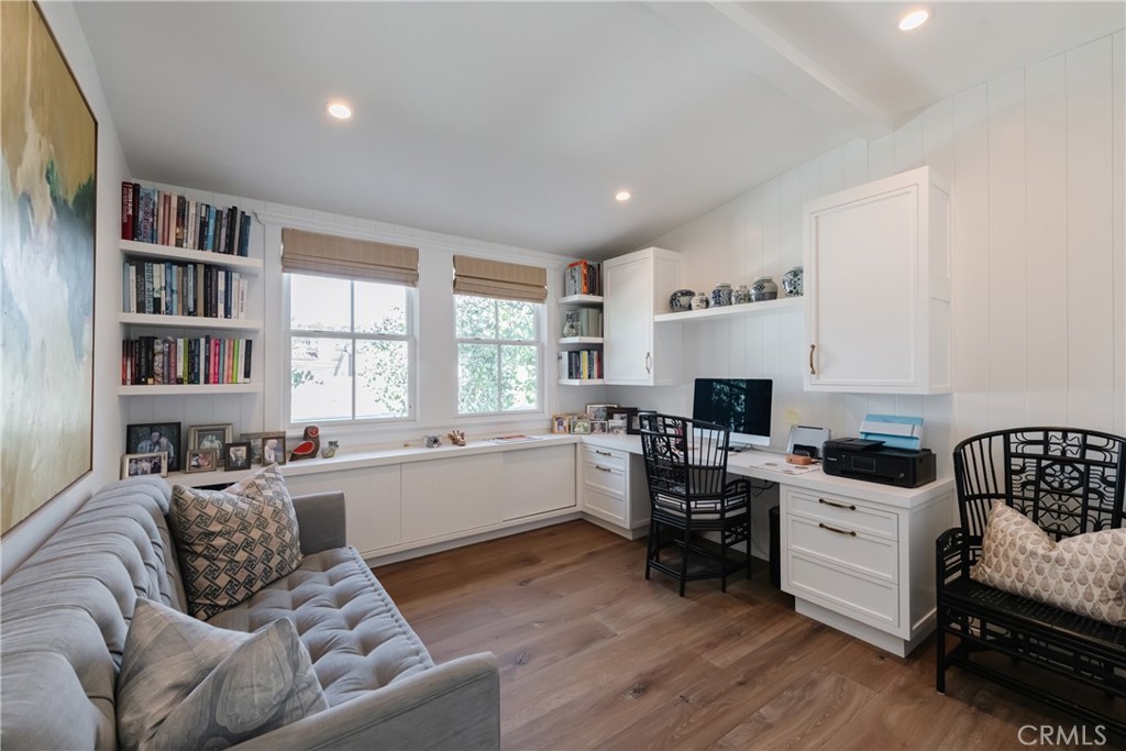 441 3rd Street Manhattan Beach, CA 90266 - Photo 25 of 30 a living room with furniture and a wooden floor