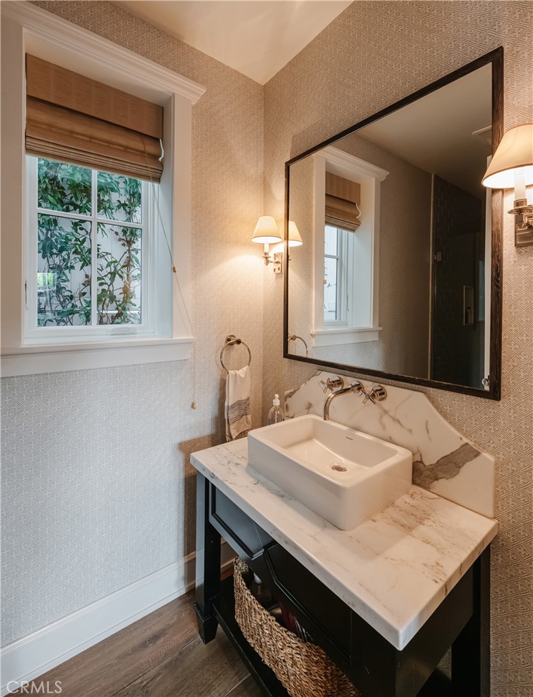 441 3rd Street Manhattan Beach, CA 90266 - Photo 27 of 30 a bathroom with a sink and a mirror