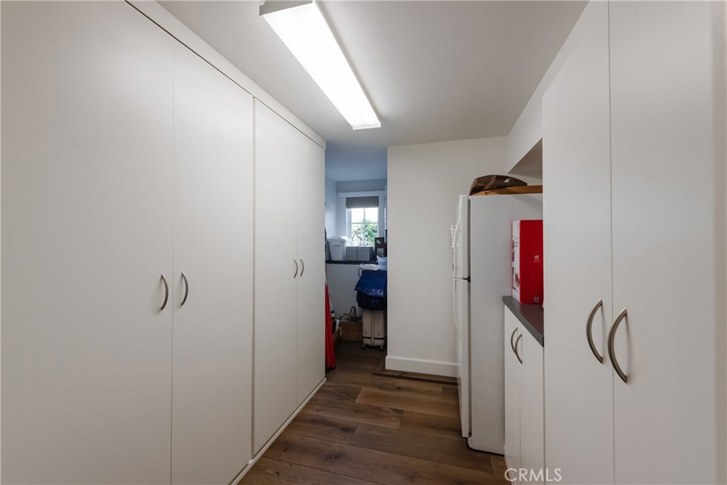441 3rd Street Manhattan Beach, CA 90266 - Photo 30 of 30 a view of a hallway with closet and wooden floor