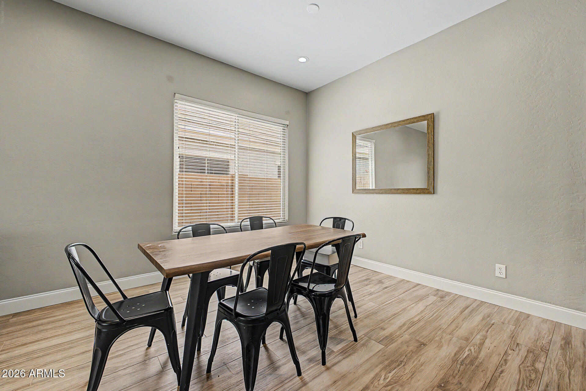 4272 East Buckboard Road Gilbert, AZ 85297 - Photo 11 of 37 a view of a dining room with furniture and window