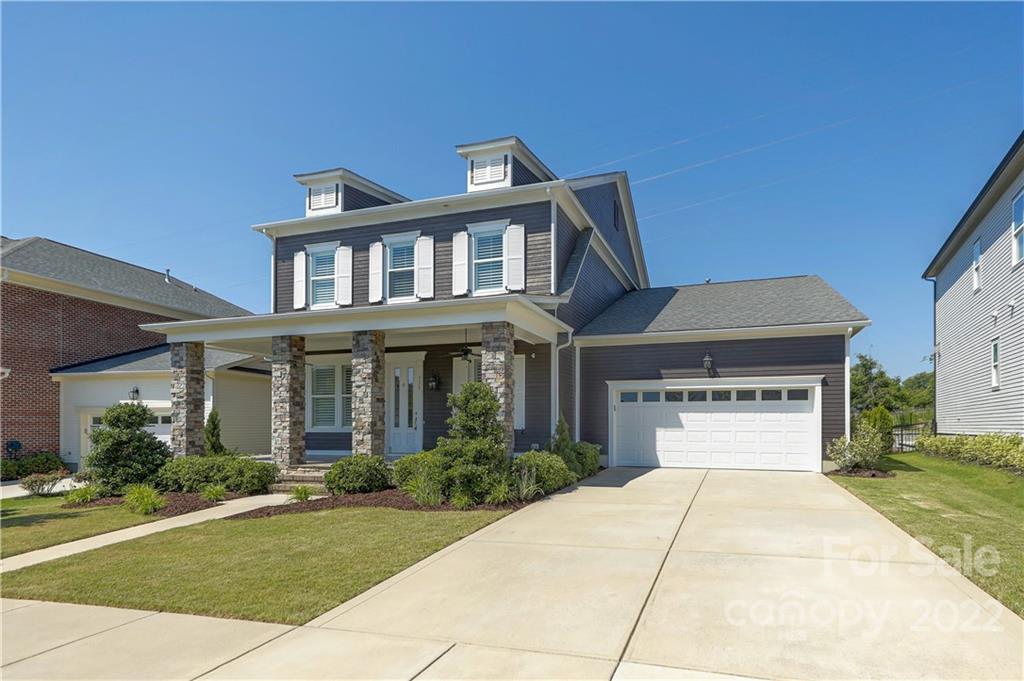 320 Sensibility Circle Fort Mill, SC 29708 - Photo 1 of 48 a front view of a house with garden