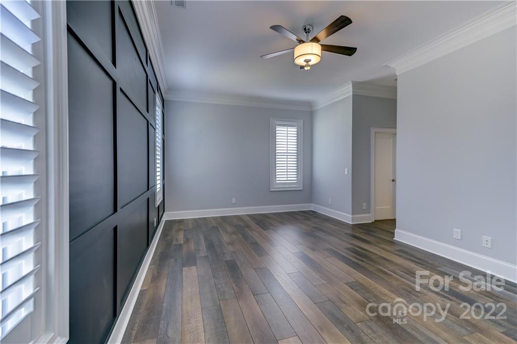 320 Sensibility Circle Fort Mill, SC 29708 - Photo 24 of 48 wooden floor in an empty room with a window