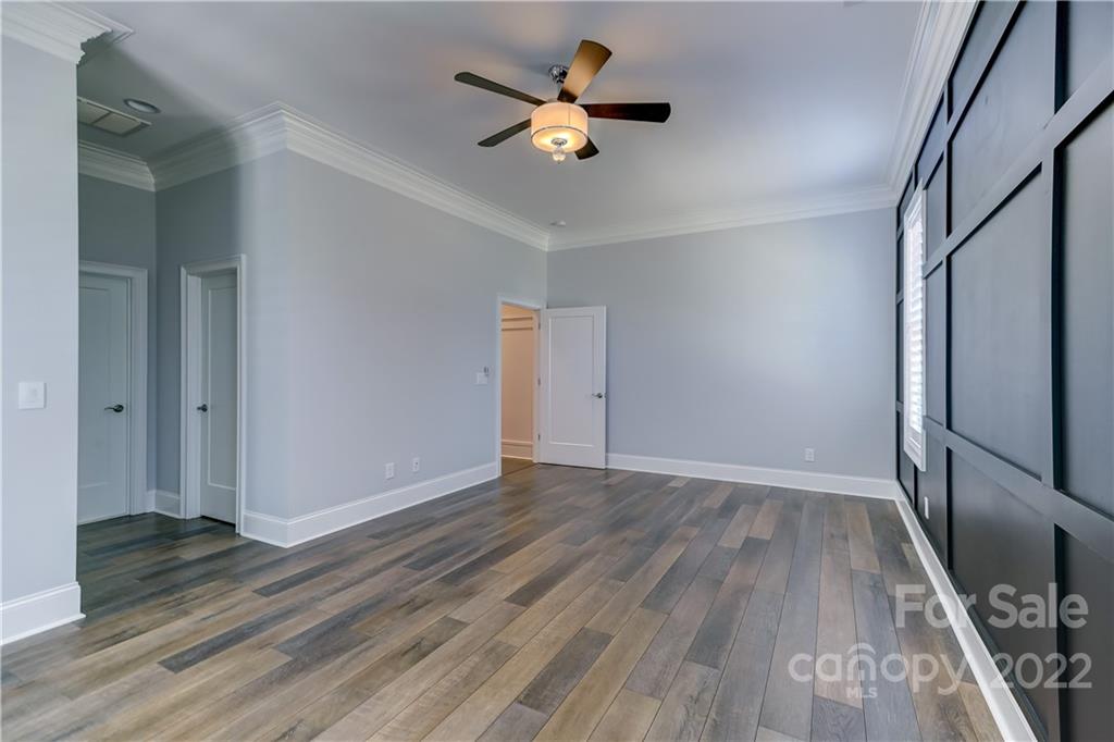 320 Sensibility Circle Fort Mill, SC 29708 - Photo 25 of 48 wooden floor in an empty room with a window