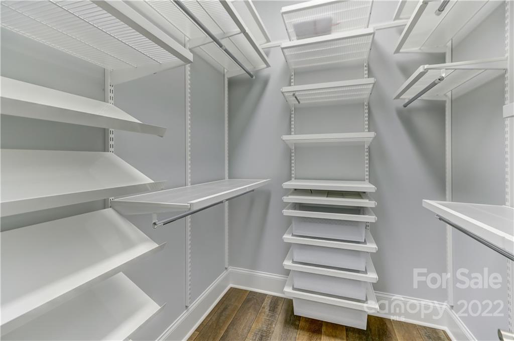 320 Sensibility Circle Fort Mill, SC 29708 - Photo 30 of 48 a view of walk in closet with empty racks