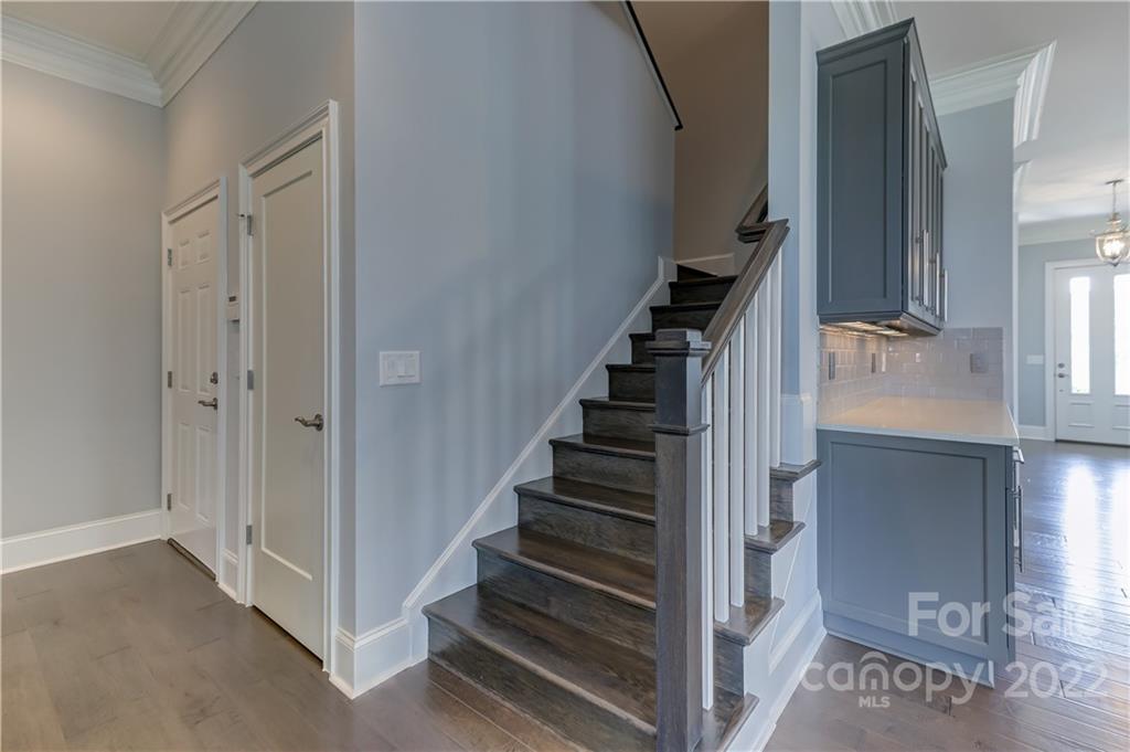 320 Sensibility Circle Fort Mill, SC 29708 - Photo 31 of 48 a view of entryway and hall with wooden floor