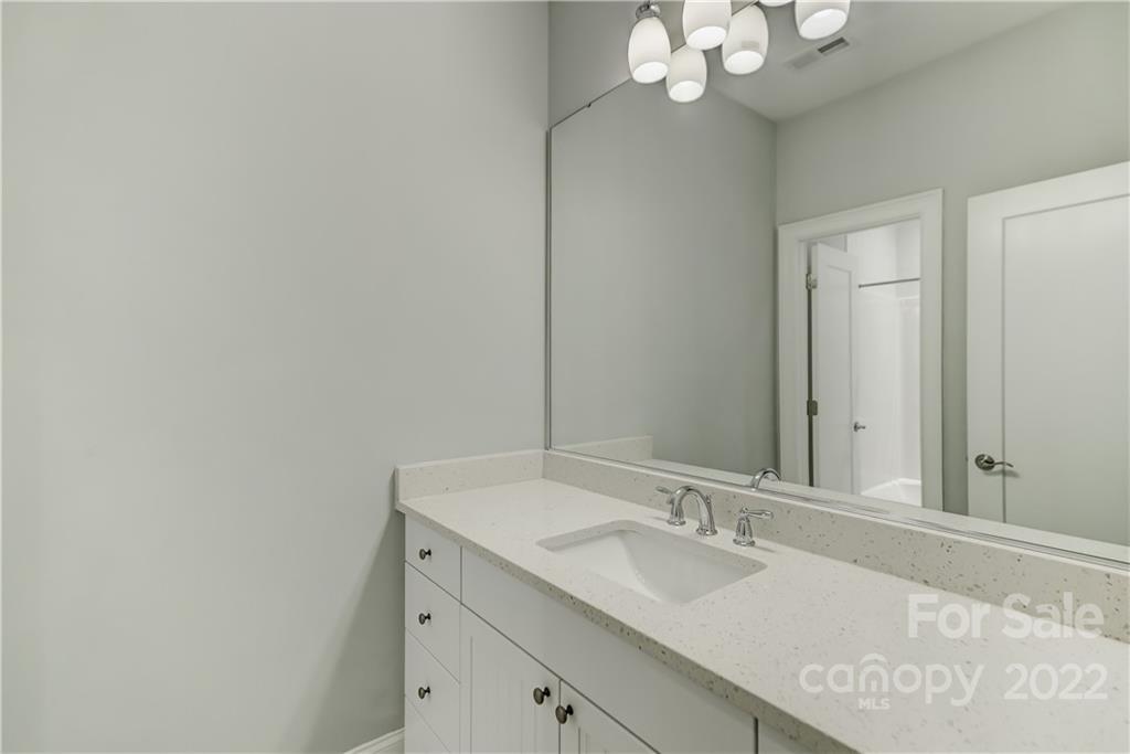 320 Sensibility Circle Fort Mill, SC 29708 - Photo 37 of 48 a bathroom with a sink and a mirror