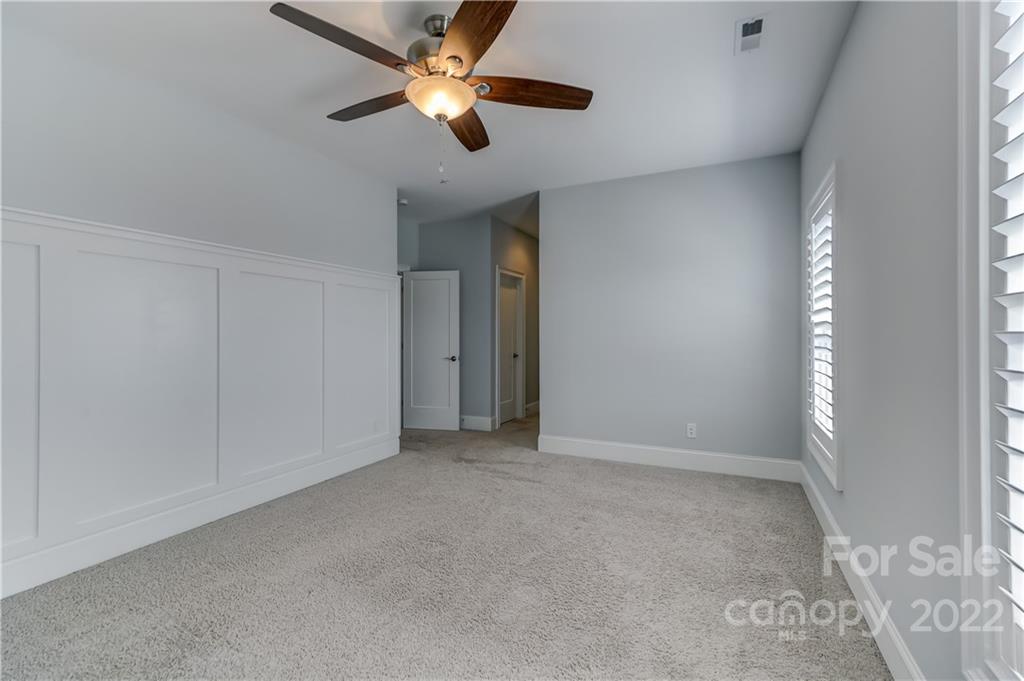 320 Sensibility Circle Fort Mill, SC 29708 - Photo 41 of 48 an empty room with chandelier fan