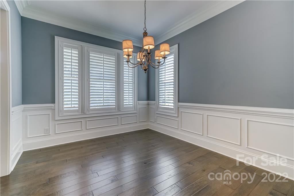 320 Sensibility Circle Fort Mill, SC 29708 - Photo 9 of 48 a view of a livingroom with a window and wooden floor