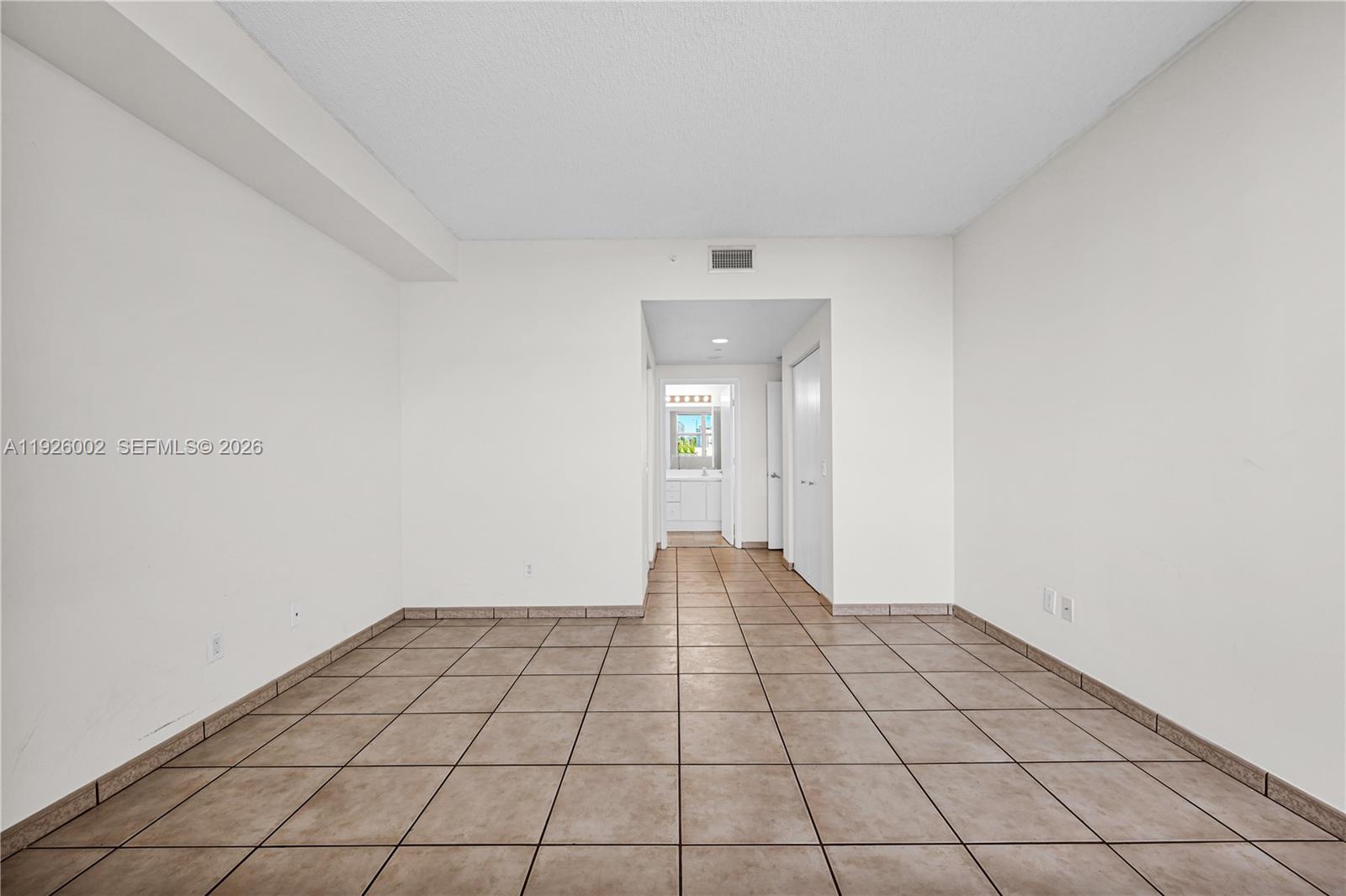 2475 Brickell Avenue, Unit 703 Miami, FL 33129 - Photo 16 of 30 a view of an empty room and window