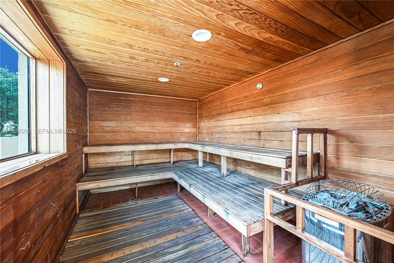 2475 Brickell Avenue, Unit 703 Miami, FL 33129 - Photo 28 of 30 a view of deck area with wooden floor and window