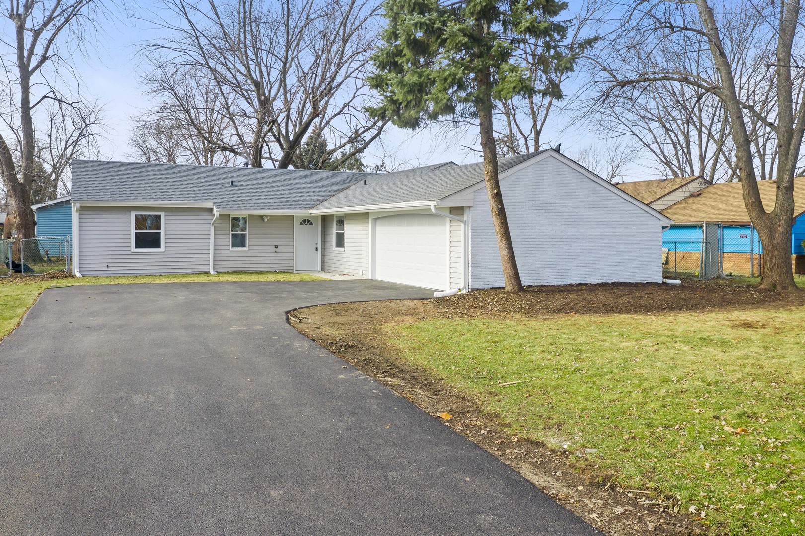 141 Mellbrook Road Bolingbrook, IL 60440 - Photo 1 of 20 a view of a house with a yard and large tree