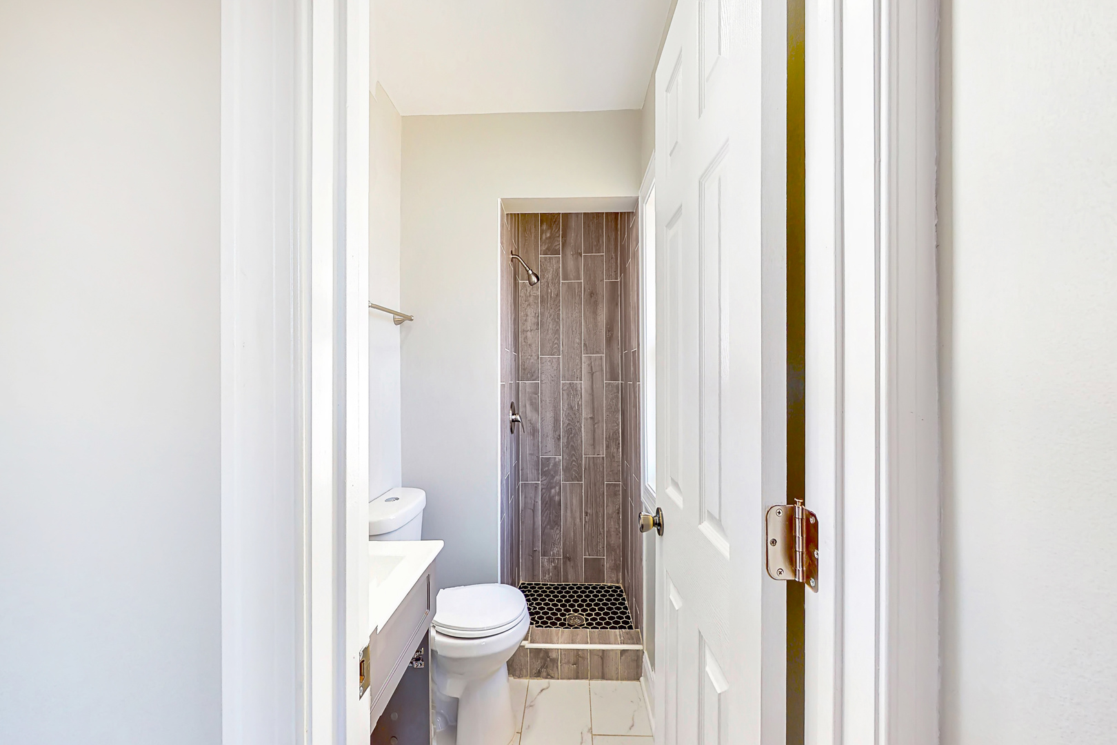 141 Mellbrook Road Bolingbrook, IL 60440 - Photo 12 of 20 a bathroom with a toilet and a shower