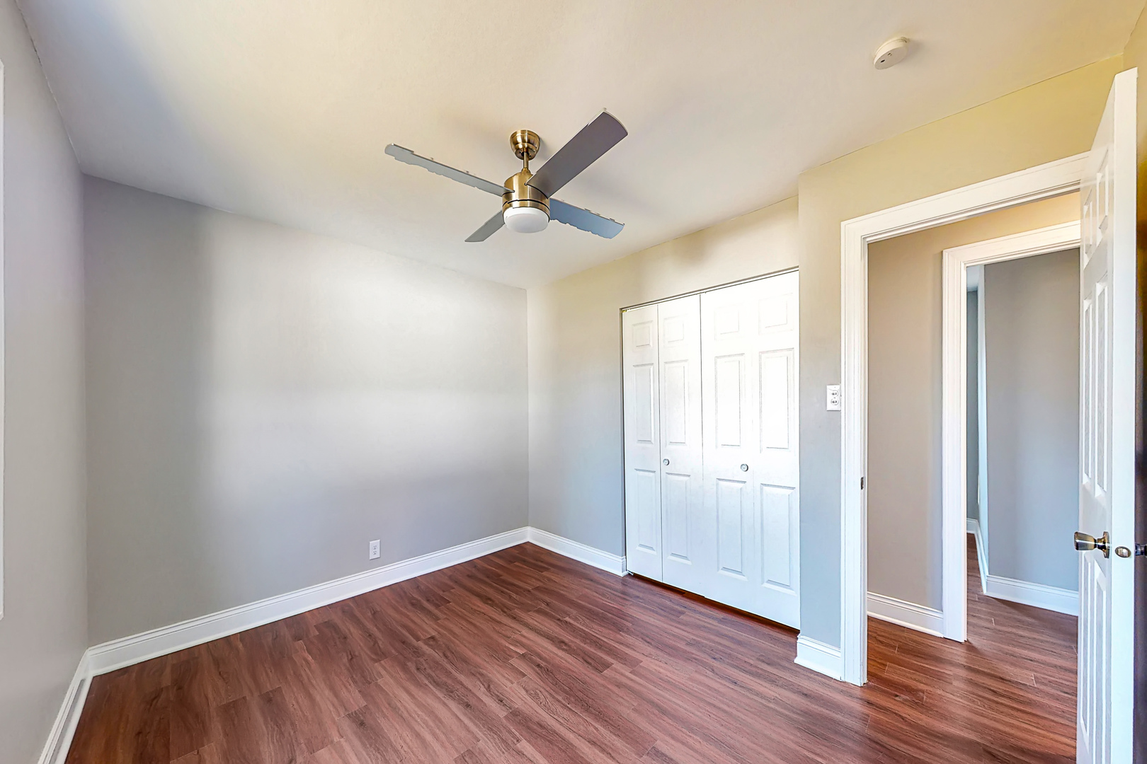 141 Mellbrook Road Bolingbrook, IL 60440 - Photo 13 of 20 an empty room with wooden floor and windows