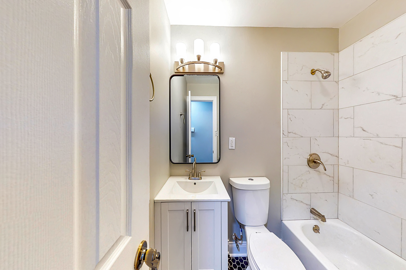 141 Mellbrook Road Bolingbrook, IL 60440 - Photo 14 of 20 a bathroom with a sink toilet and shower