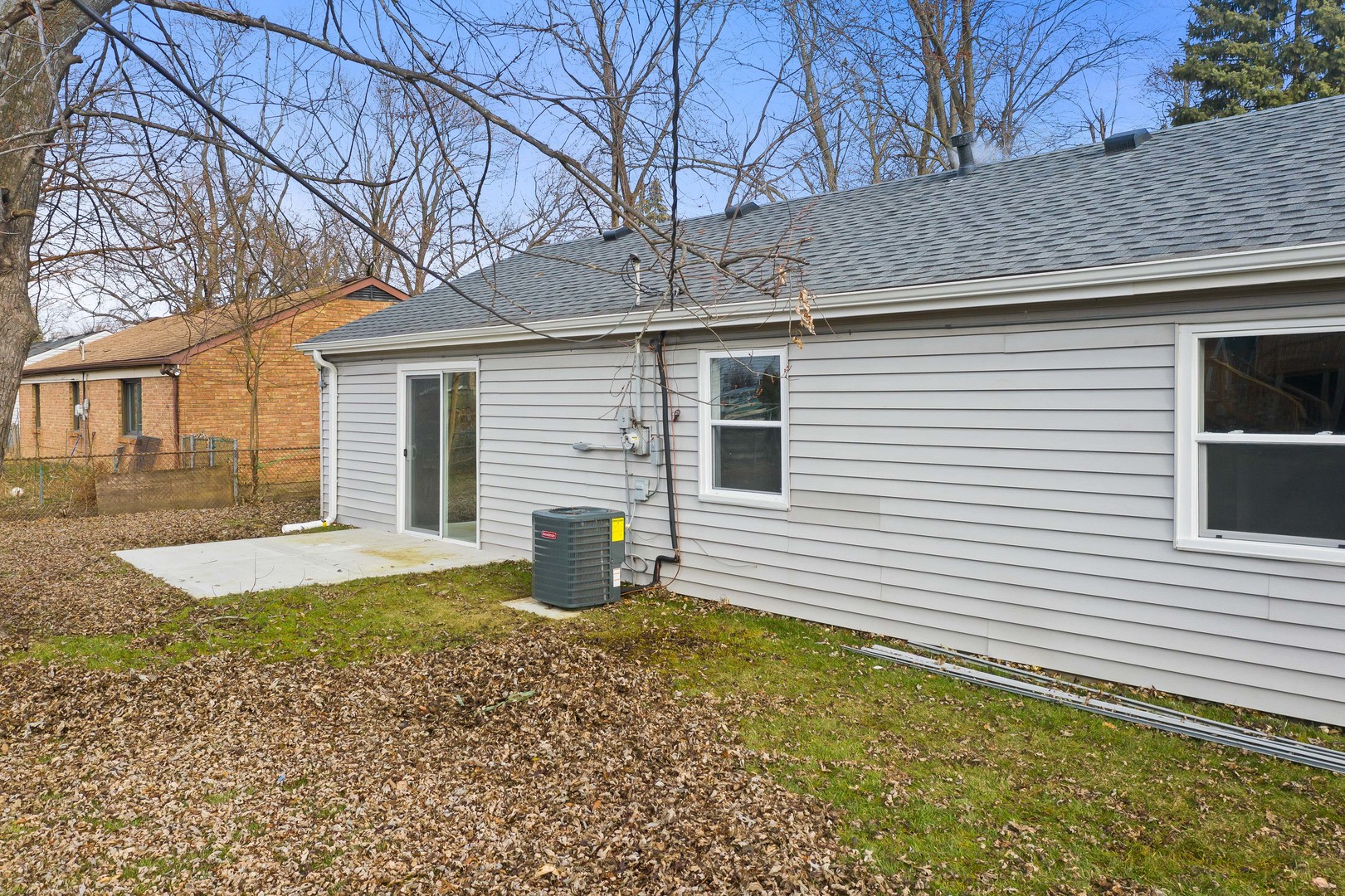 141 Mellbrook Road Bolingbrook, IL 60440 - Photo 19 of 20 a front view of a house with a yard and garage