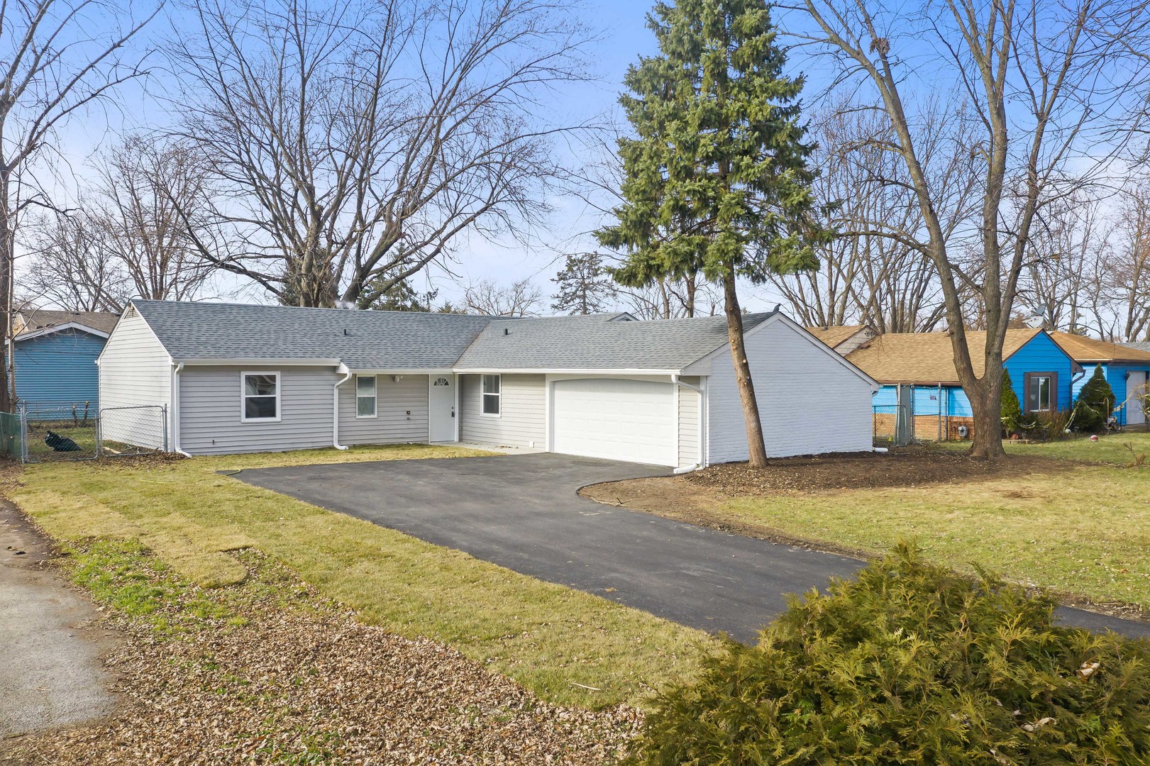 141 Mellbrook Road Bolingbrook, IL 60440 - Photo 2 of 20 a front view of house with yard and trees