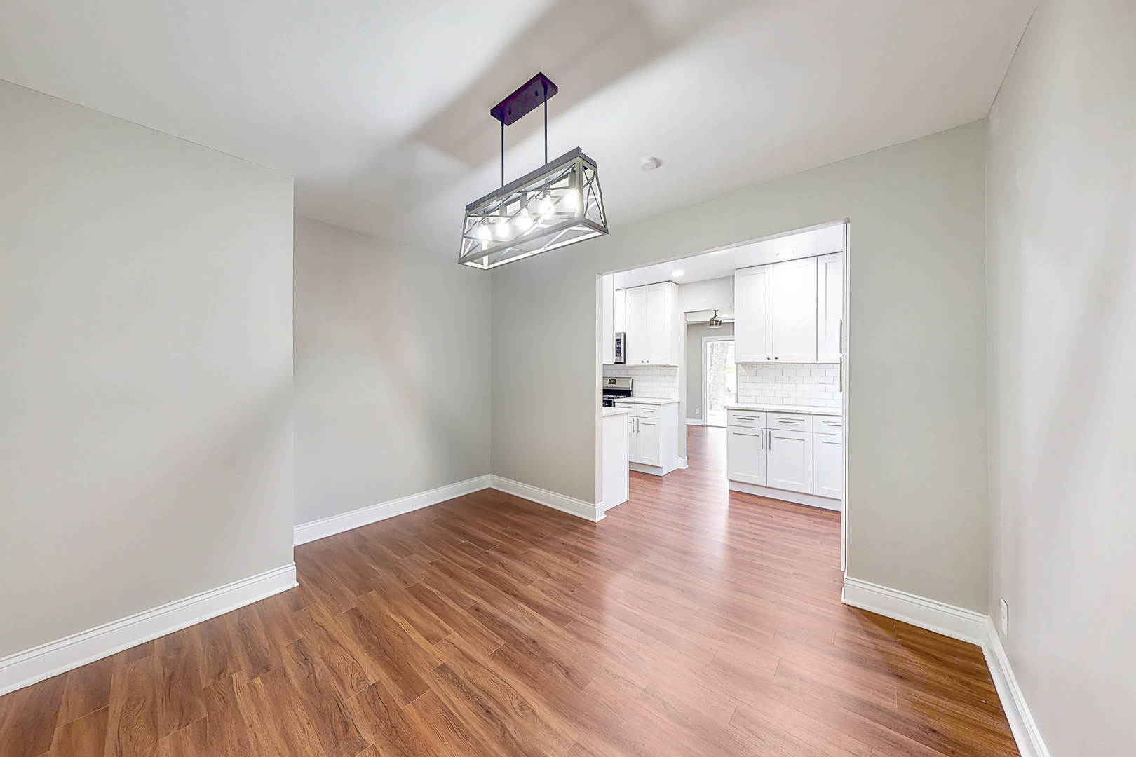 141 Mellbrook Road Bolingbrook, IL 60440 - Photo 10 of 20 a view of empty room with wooden floor and window