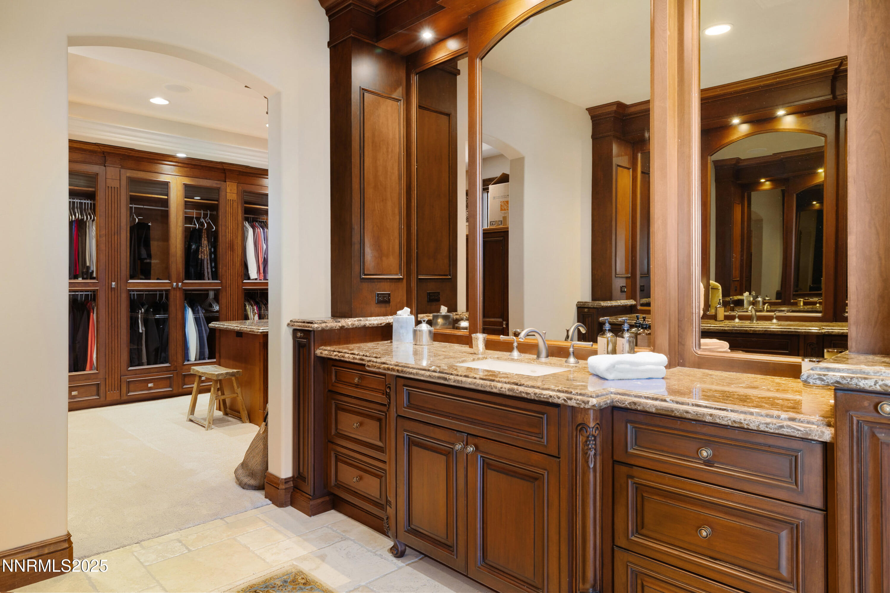 5775 Lausanne Drive Reno, NV 89511 - Photo 24 of 69 a bathroom with a double vanity sink and a mirror