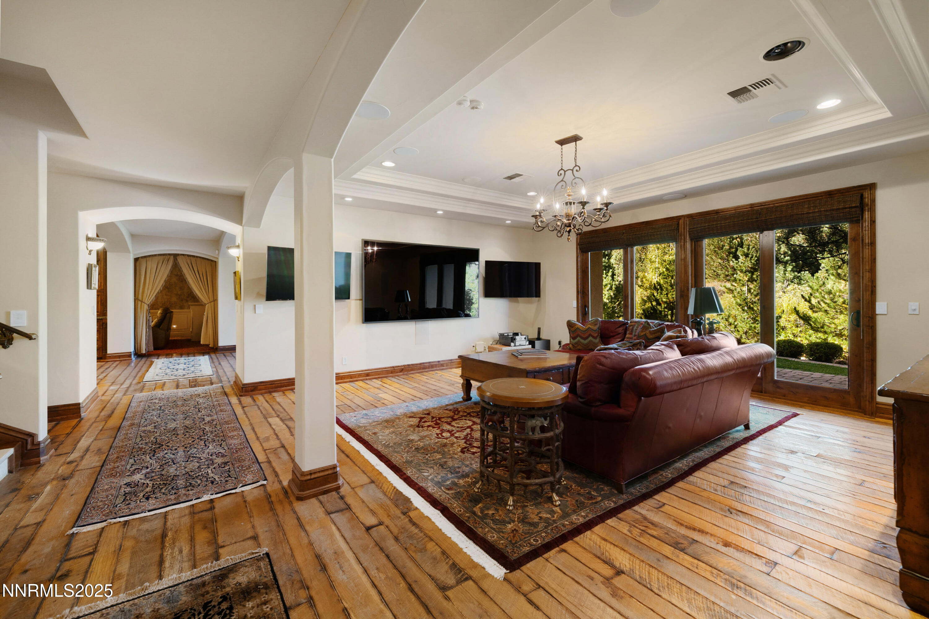 5775 Lausanne Drive Reno, NV 89511 - Photo 39 of 69 a living room with furniture and a flat screen tv
