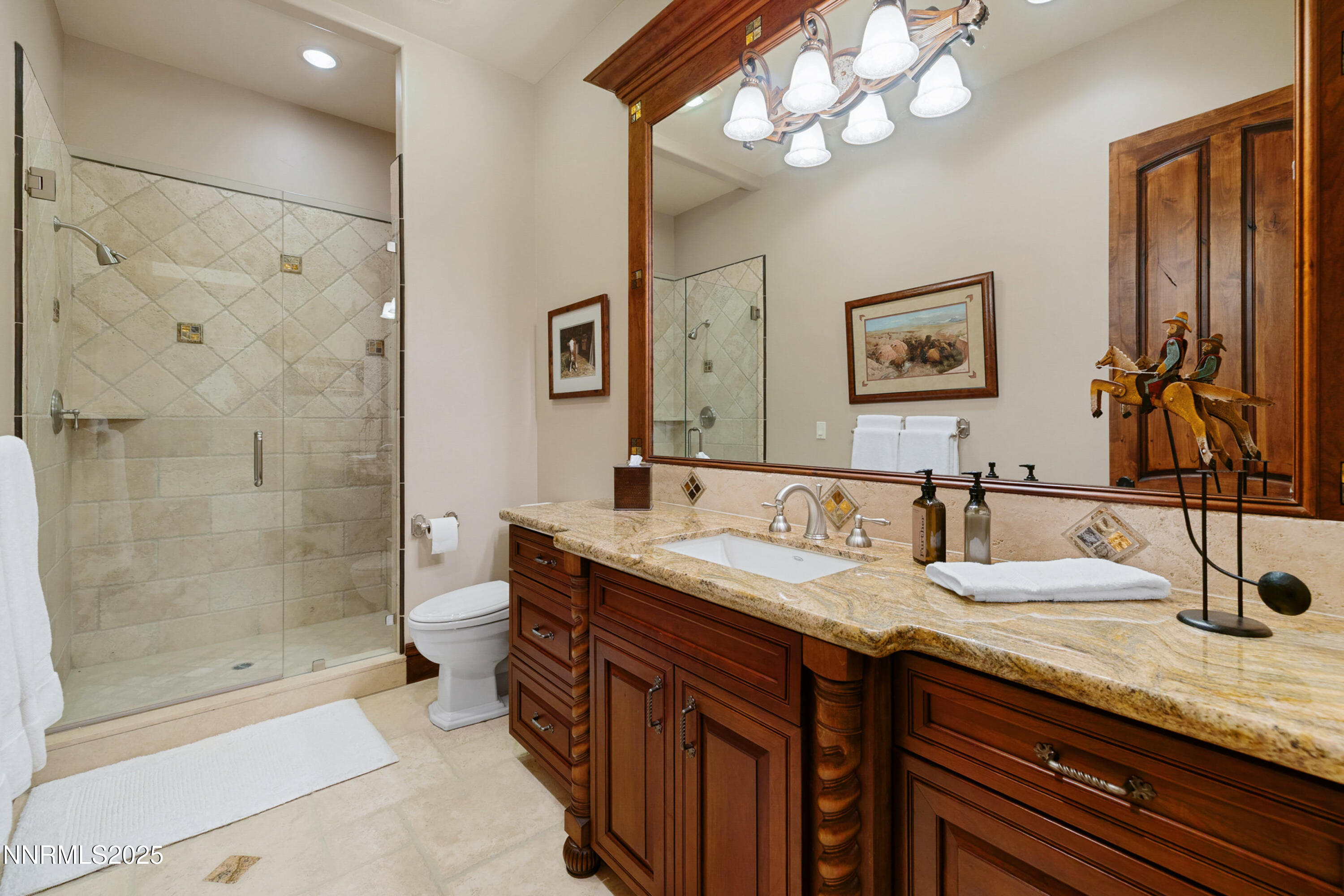 5775 Lausanne Drive Reno, NV 89511 - Photo 47 of 69 a bathroom with a double vanity sink mirror and shower