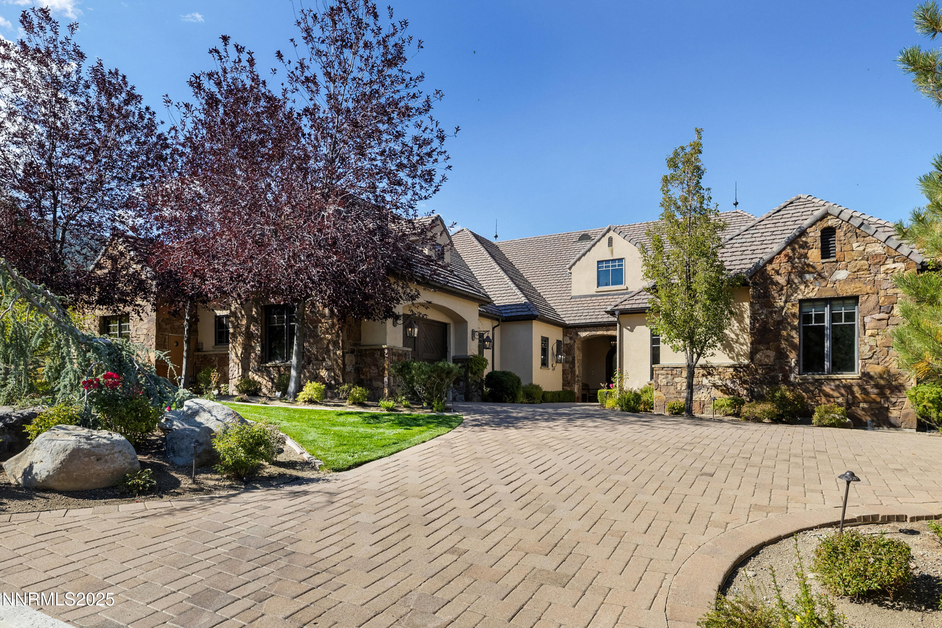 5775 Lausanne Drive Reno, NV 89511 - Photo 56 of 69 a front view of a house with a yard