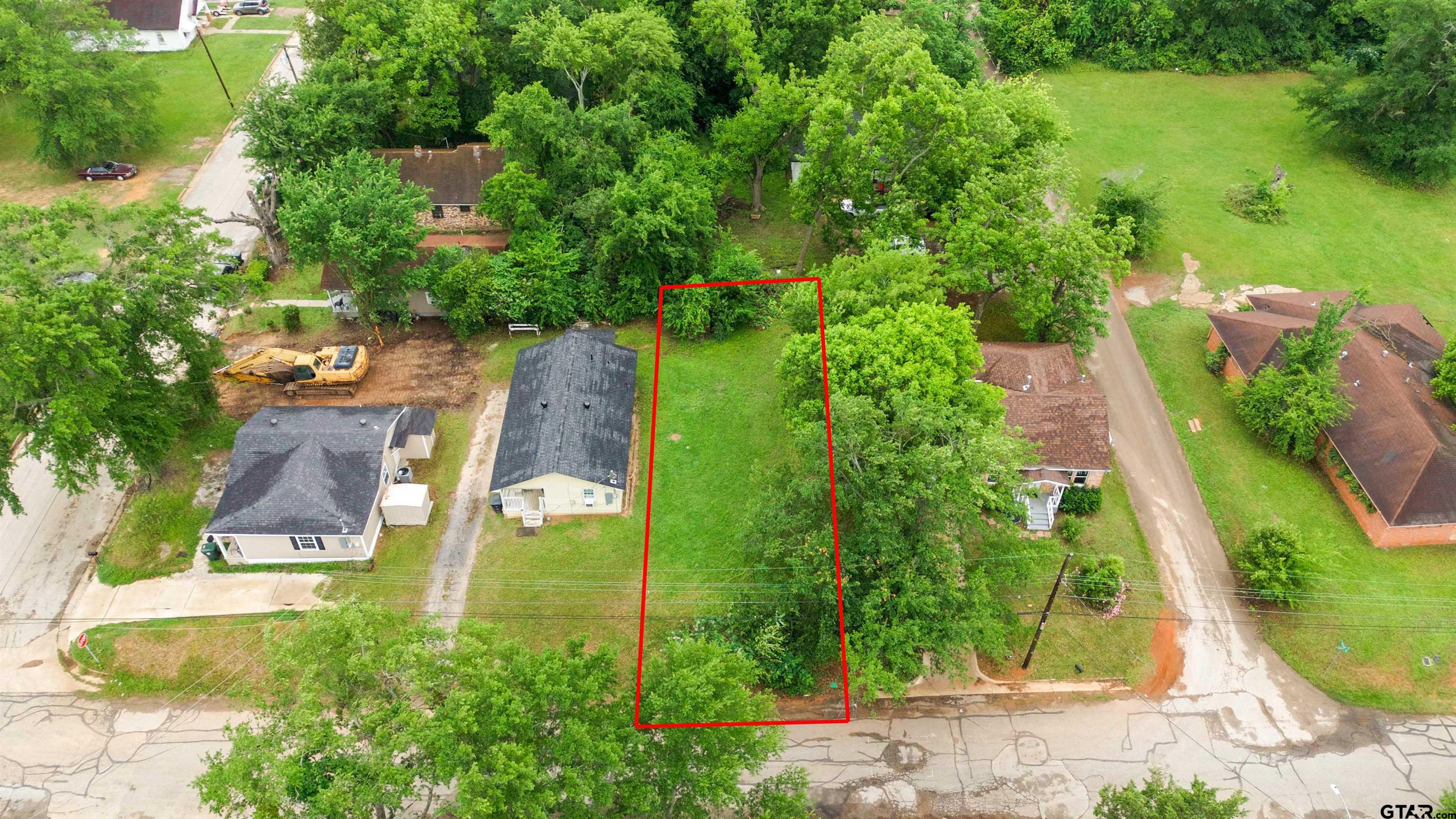 730 West Nutbush Street Tyler, TX 75702 - Photo 5 of 9 an aerial view of a house with a yard basket ball court and outdoor seating