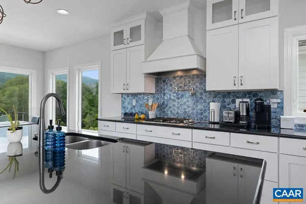 a living room with furniture flat screen tv and a fireplace
