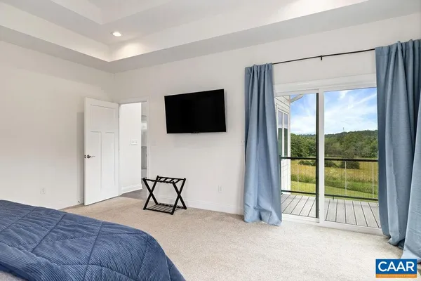 a view of a lake with a yard