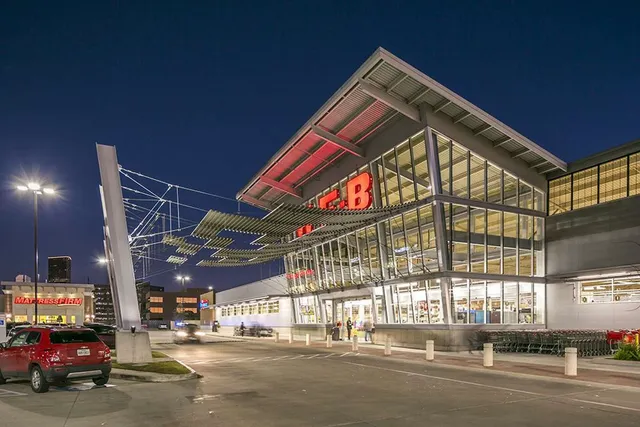 a swimming pool with outdoor seating