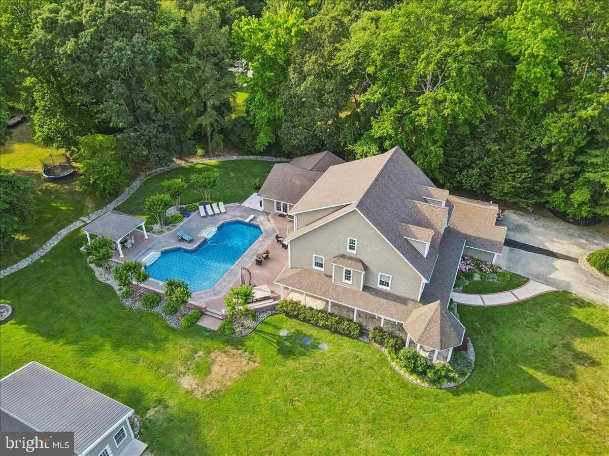 102 Little Neck Road Stevensville, MD 21666 - Photo 73 of 77 an aerial view of a house with garden space and street view