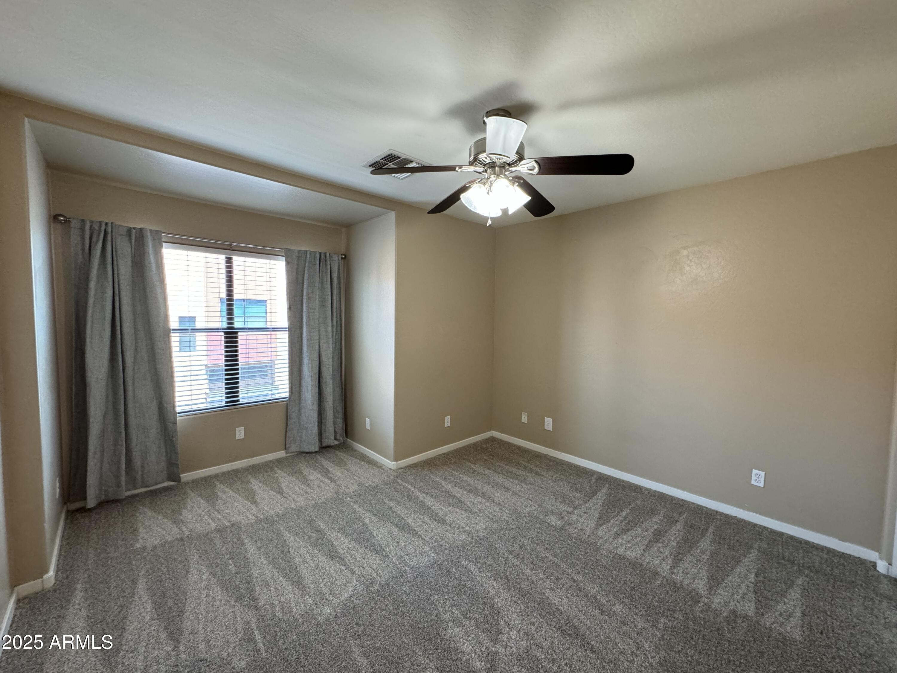 305 South Wilson Street, Unit 111 Tempe, AZ 85281 - Photo 35 of 48 wooden floor in an empty room with a window