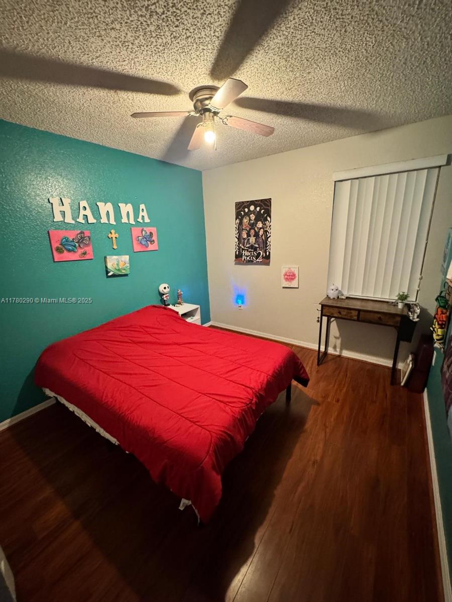 Richmond Heights Miami, FL 33176 - Photo 3 of 7 a bed sitting in a bedroom next to a window