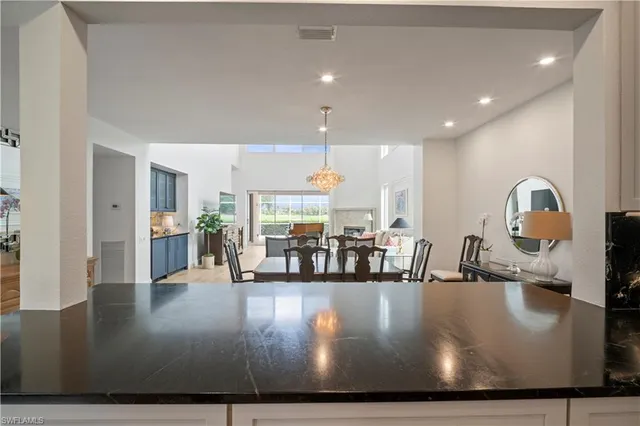 a view of a living room and dining room