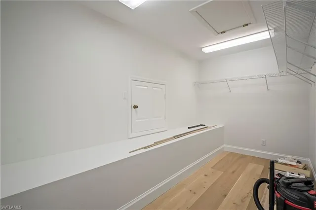 a view of a room with racks on the wall