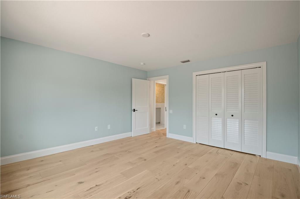 11448 Quail Village Way Naples, FL 34119 - Photo 30 of 41 a view of an empty room