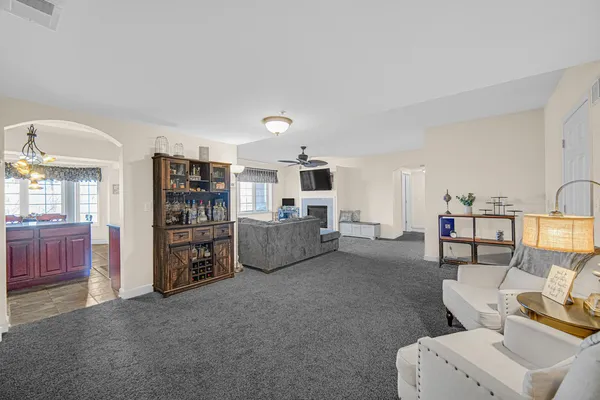 a living room with furniture and a couch
