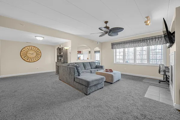 a living room with furniture and a window