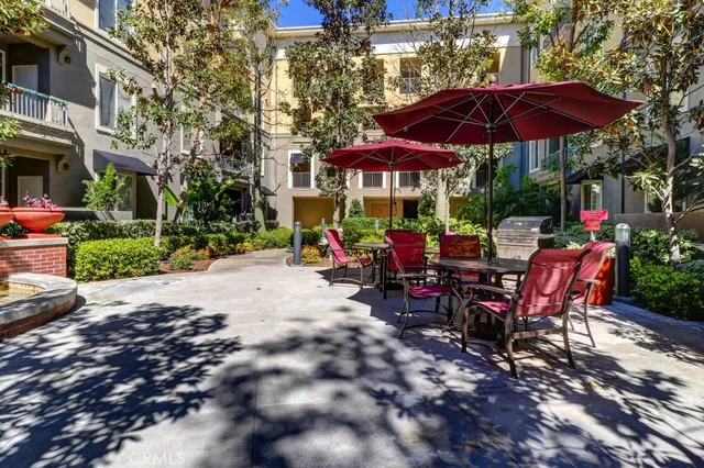 a view of a chairs and tables in the patio