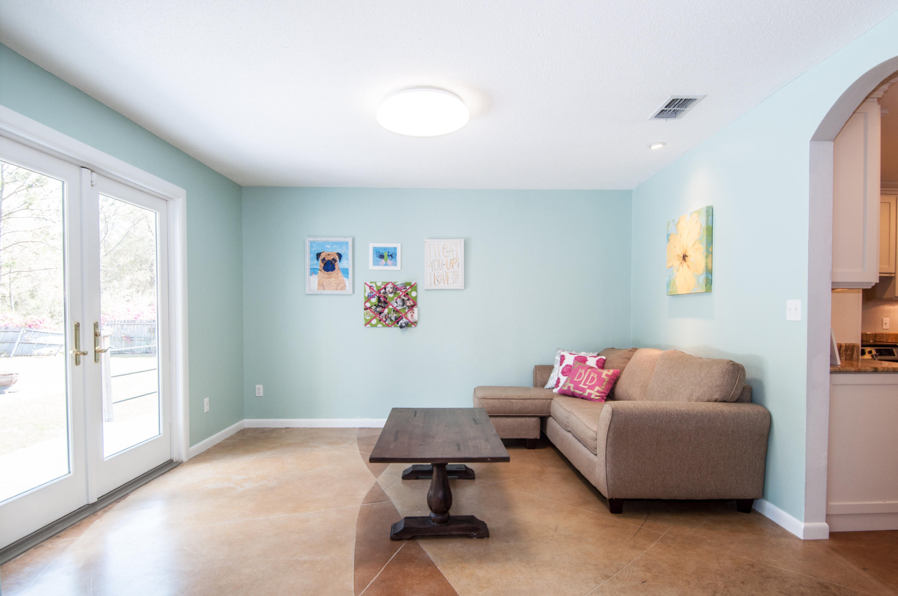 255 Ridge Lake Road Crestview, FL 32536 - Photo 18 of 54 a living room with furniture and a window