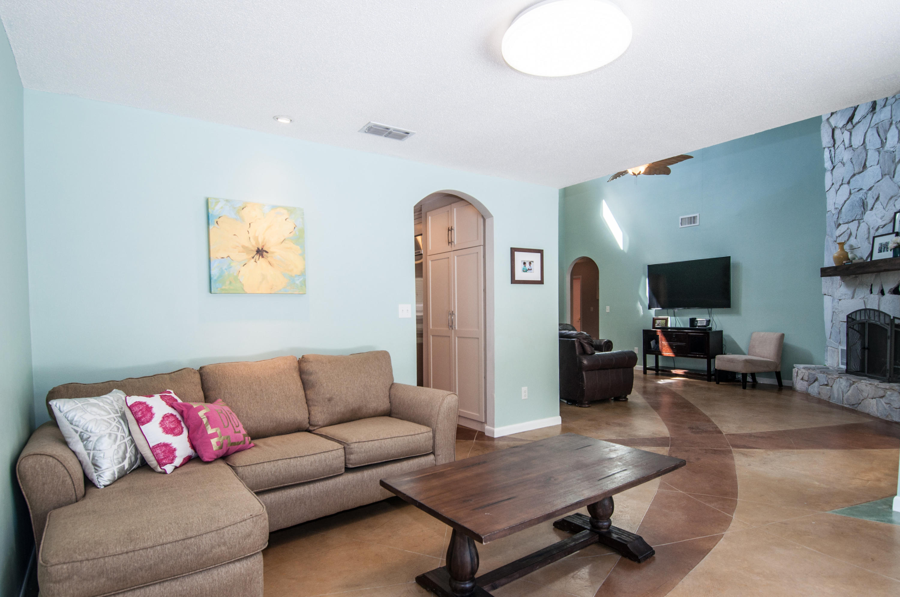 255 Ridge Lake Road Crestview, FL 32536 - Photo 20 of 54 a living room with furniture and a flat screen tv
