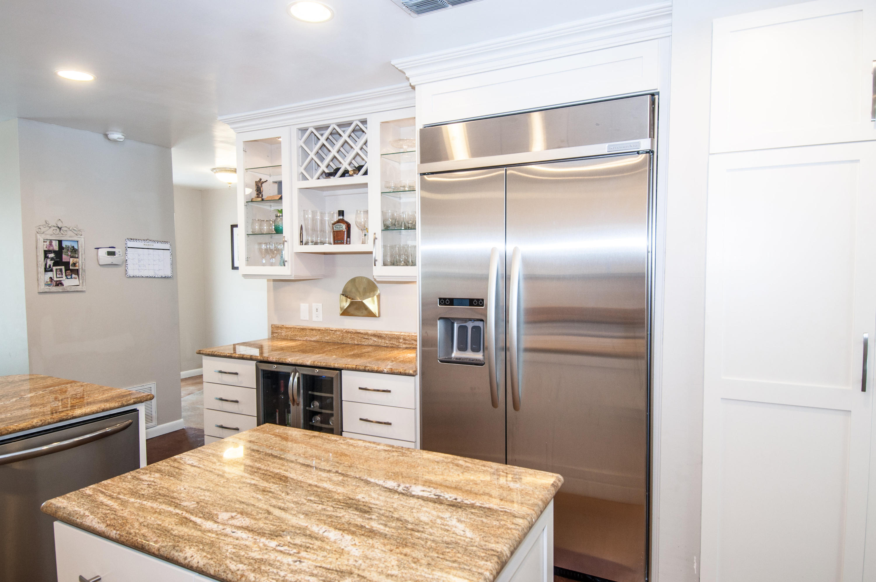 255 Ridge Lake Road Crestview, FL 32536 - Photo 29 of 54 a kitchen with a refrigerator and cabinets