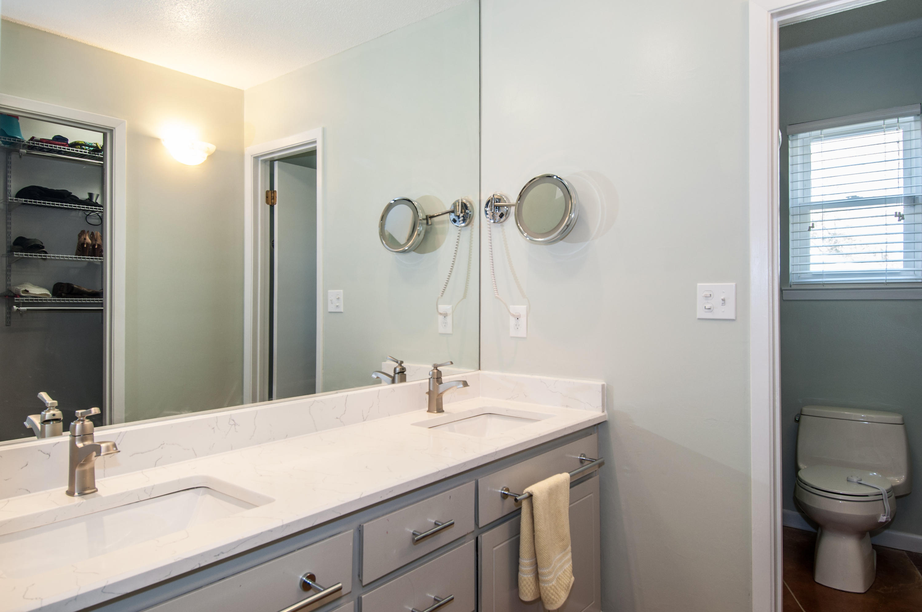 255 Ridge Lake Road Crestview, FL 32536 - Photo 39 of 54 a bathroom with a sink and a mirror