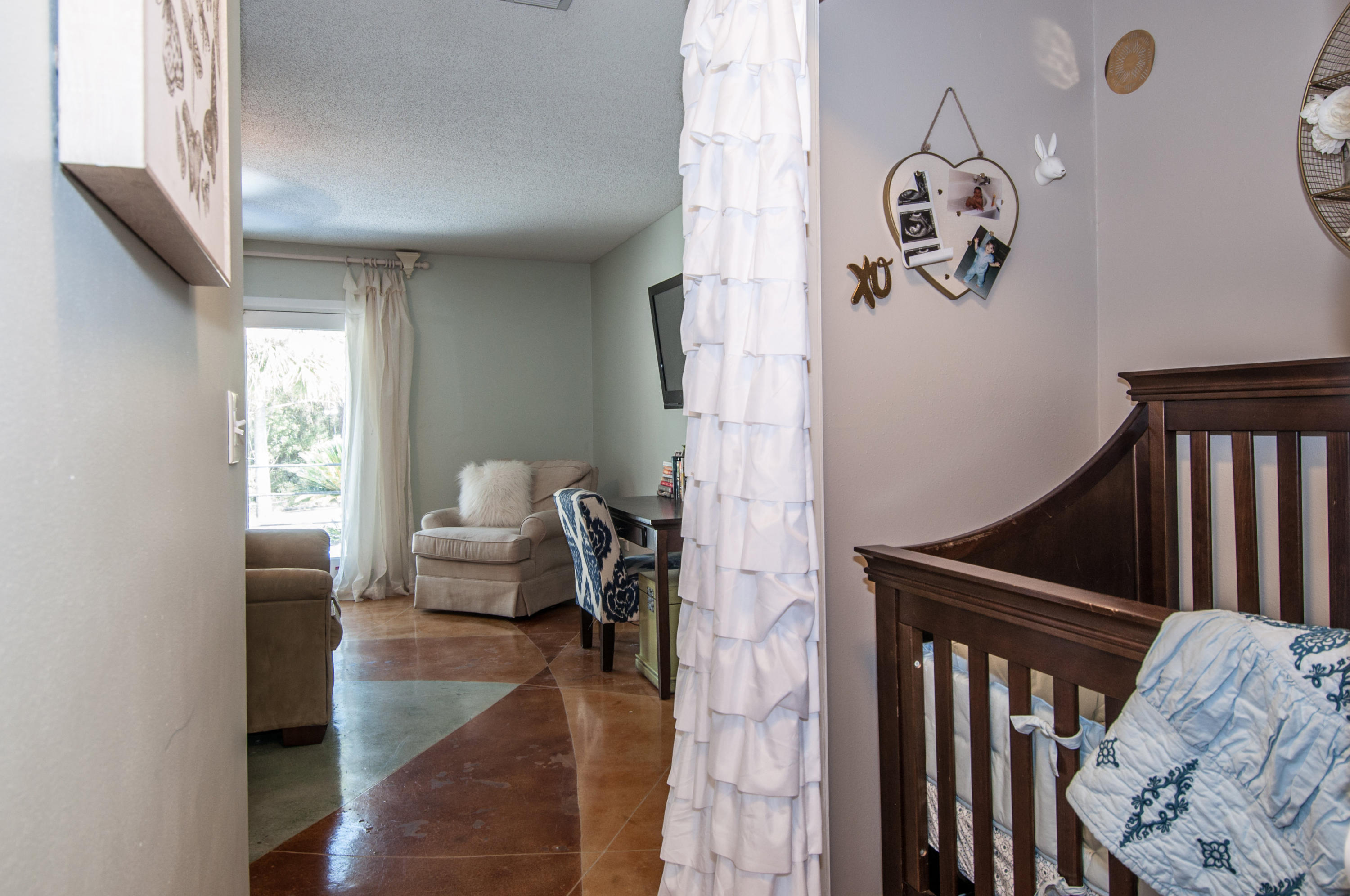 255 Ridge Lake Road Crestview, FL 32536 - Photo 42 of 54 a living room with furniture and a window